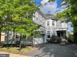 8341 Tillett Loop, Manassas, VA 20110 - view of front of home with an attached garage and driveway