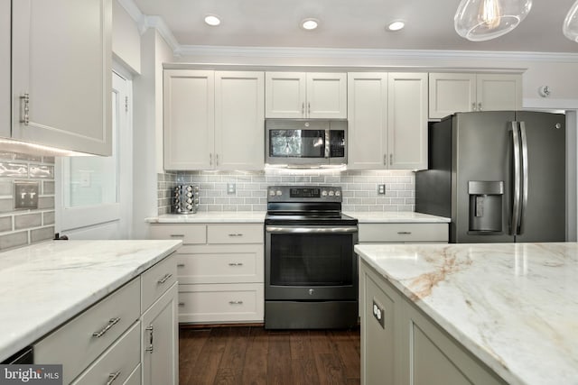 1704 N Royal Ave, Front Royal, VA 22630 - kitchen with stainless steel appliances, crown molding, light stone counters, tasteful backsplash, and recessed lighting