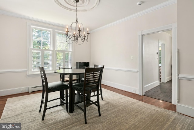 1704 N Royal Ave, Front Royal, VA 22630 - dining space with wood finished floors, a chandelier, ornamental molding, and a baseboard heating unit