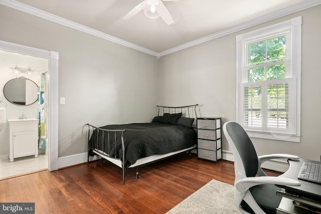 1704 N Royal Ave, Front Royal, VA 22630 - bedroom with wood finished floors, ornamental molding, a desk, a ceiling fan, and a baseboard radiator