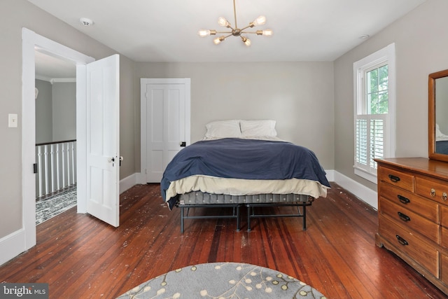 1704 N Royal Ave, Front Royal, VA 22630 - bedroom featuring hardwood / wood-style flooring and a chandelier