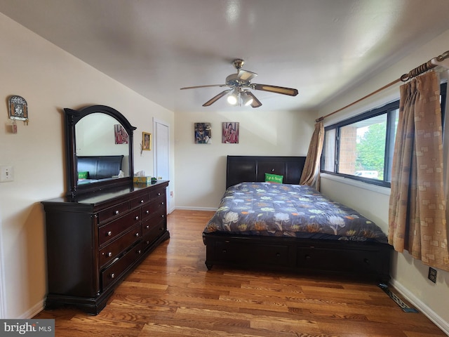 74 Probasco Rd, Hightstown, NJ 08520 - bedroom featuring wood finished floors, baseboards, and a ceiling fan