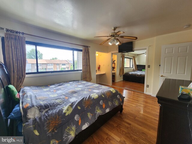74 Probasco Rd, Hightstown, NJ 08520 - bedroom featuring wood finished floors, ceiling fan, and baseboards