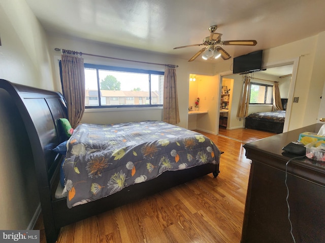 74 Probasco Rd, Hightstown, NJ 08520 - bedroom with multiple windows, wood finished floors, baseboards, and ceiling fan