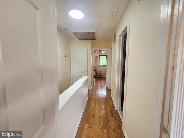 74 Probasco Rd, Hightstown, NJ 08520 - hallway with attic access, wood finished floors, and an upstairs landing
