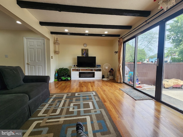 74 Probasco Rd, Hightstown, NJ 08520 - living area featuring wood finished floors, beam ceiling, and recessed lighting