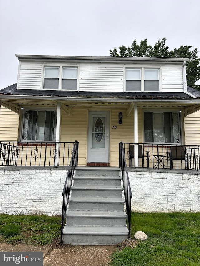 15 Homberg Ave, Baltimore, MD 21221 - view of front facade featuring a porch