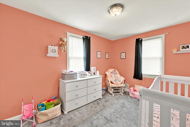 15 Homberg Ave, Baltimore, MD 21221 - carpeted bedroom with multiple windows and a nursery area