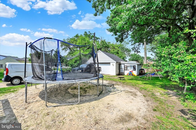 15 Homberg Ave, Baltimore, MD 21221 - view of yard featuring a trampoline and an outbuilding