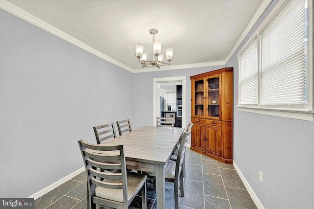15 Homberg Ave, Baltimore, MD 21221 - dining space featuring a chandelier, baseboards, and crown molding