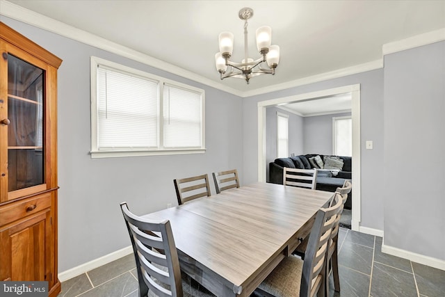 15 Homberg Ave, Baltimore, MD 21221 - dining room featuring a chandelier, baseboards, and ornamental molding