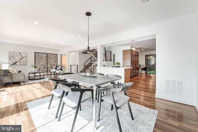 2127 Cabots Point Ln, Reston, VA 20191 - dining space with stairs, wood finished floors, and recessed lighting