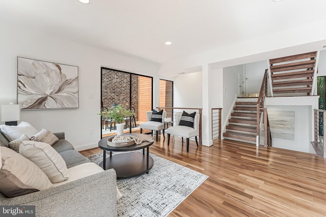 2127 Cabots Point Ln, Reston, VA 20191 - living area with light wood-style flooring, stairs, and recessed lighting