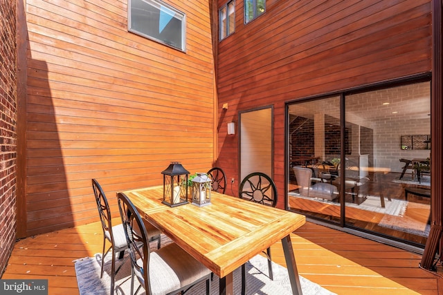 2127 Cabots Point Ln, Reston, VA 20191 - dining space featuring wood-type flooring and wooden walls