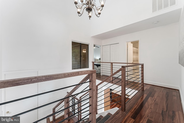 2127 Cabots Point Ln, Reston, VA 20191 - hall with an upstairs landing, a chandelier, wood finished floors, and a high ceiling