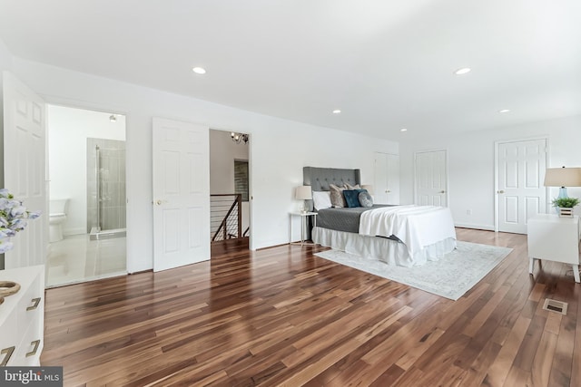 2127 Cabots Point Ln, Reston, VA 20191 - bedroom with wood finished floors, ensuite bathroom, and recessed lighting