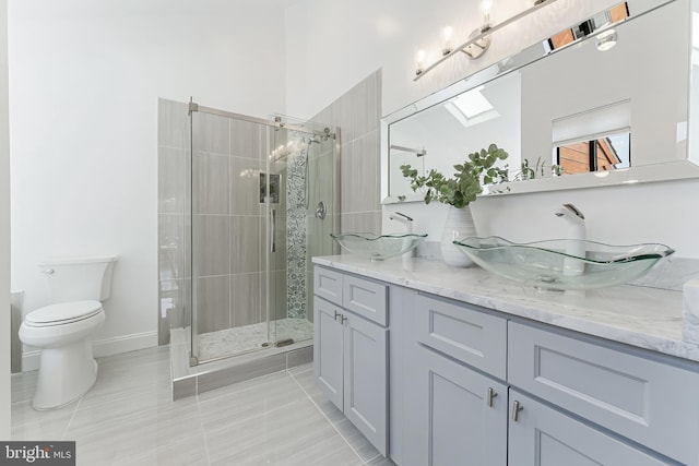 2127 Cabots Point Ln, Reston, VA 20191 - full bathroom with double vanity, a shower stall, and tile patterned floors
