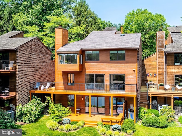 2127 Cabots Point Ln, Reston, VA 20191 - rear view of property featuring a deck and a chimney
