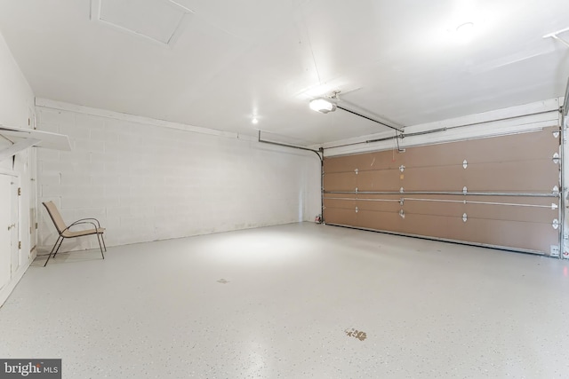 2127 Cabots Point Ln, Reston, VA 20191 - garage featuring concrete block wall and a garage door opener