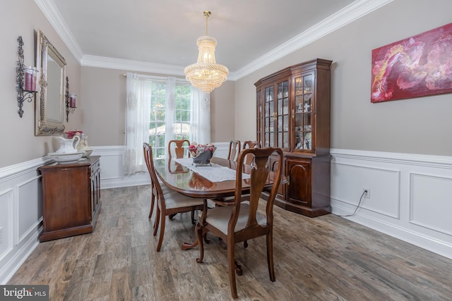 11 Harvest Dr, Pittsgrove, NJ 08318 - dining room featuring a decorative wall, a chandelier, wainscoting, ornamental molding, and wood finished floors