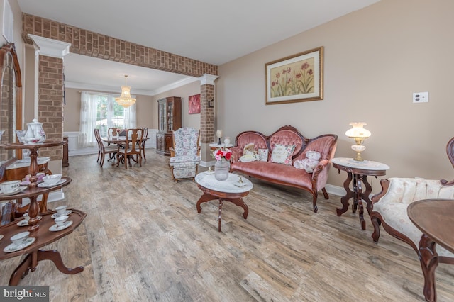 11 Harvest Dr, Pittsgrove, NJ 08318 - living area featuring ornate columns, wood finished floors, crown molding, wainscoting, and baseboards