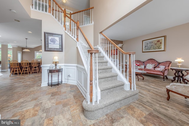 11 Harvest Dr, Pittsgrove, NJ 08318 - stairway with stone tile flooring, a high ceiling, and baseboards