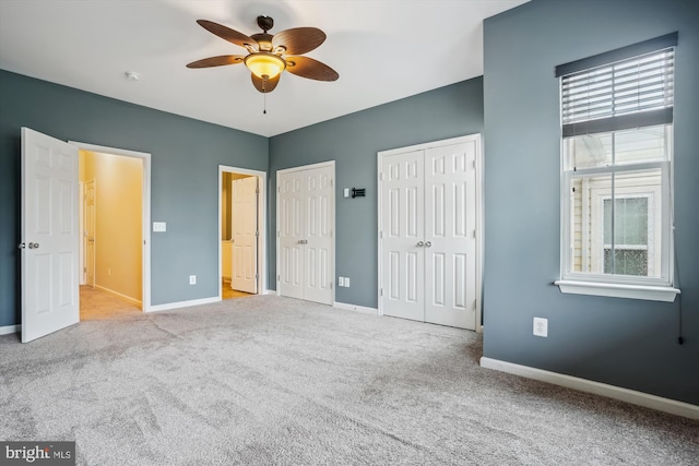 16758 Blackjack Oak Ln, Woodbridge, VA 22191 - unfurnished bedroom with two closets, carpet floors, and baseboards