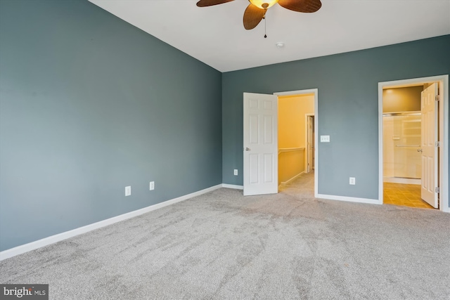 16758 Blackjack Oak Ln, Woodbridge, VA 22191 - unfurnished bedroom with carpet, baseboards, connected bathroom, and a ceiling fan