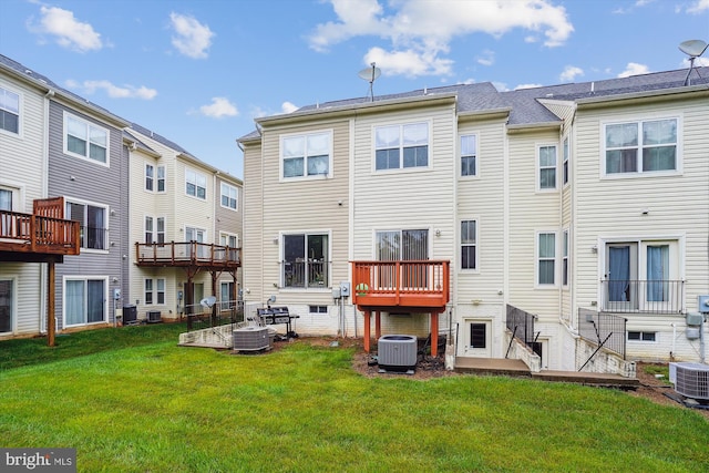 16758 Blackjack Oak Ln, Woodbridge, VA 22191 - rear view of house with central AC and a lawn
