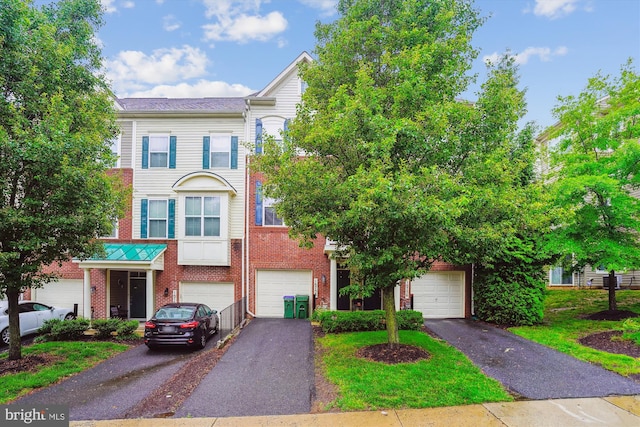 16758 Blackjack Oak Ln, Woodbridge, VA 22191 - view of property with brick siding, driveway, and an attached garage
