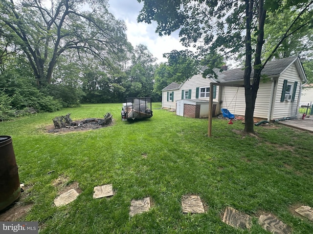 65 Rachel Ln, Inwood, WV 25428 - view of green lawn featuring an outbuilding