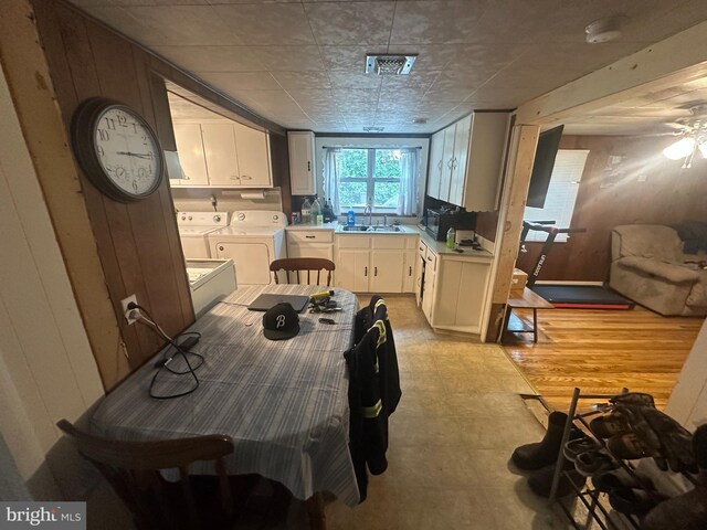 65 Rachel Ln, Inwood, WV 25428 - dining space with washer and clothes dryer, light floors, and a ceiling fan