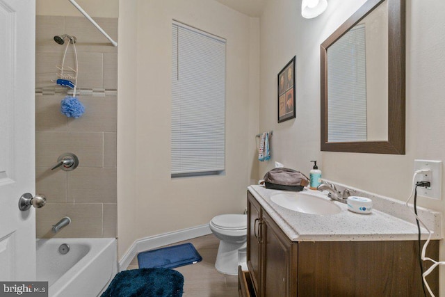 2740 Saint Paul St, Baltimore, MD 21218 - full bath with vanity, toilet, tub / shower combination, and baseboards