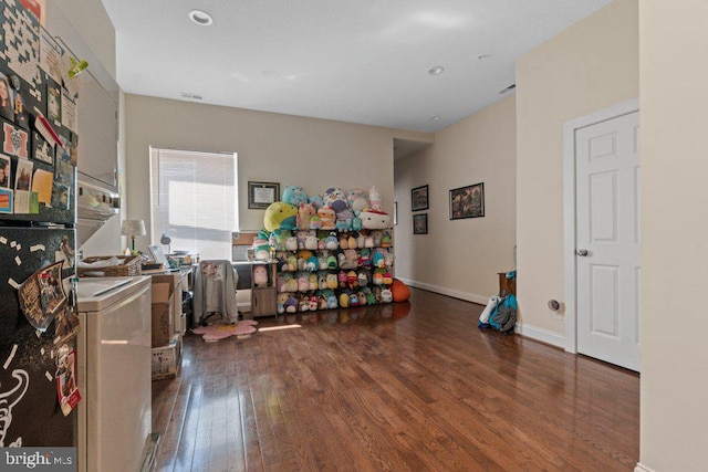 2740 Saint Paul St, Baltimore, MD 21218 - office with hardwood / wood-style flooring, washer / clothes dryer, and baseboards