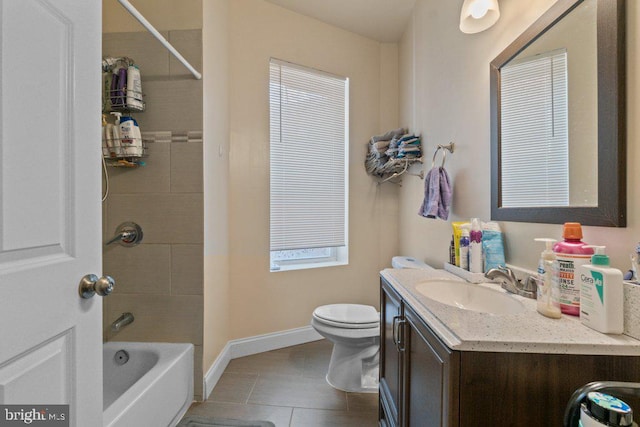 2740 Saint Paul St, Baltimore, MD 21218 - bathroom with vanity, toilet, shower / bathtub combination, tile patterned flooring, and baseboards