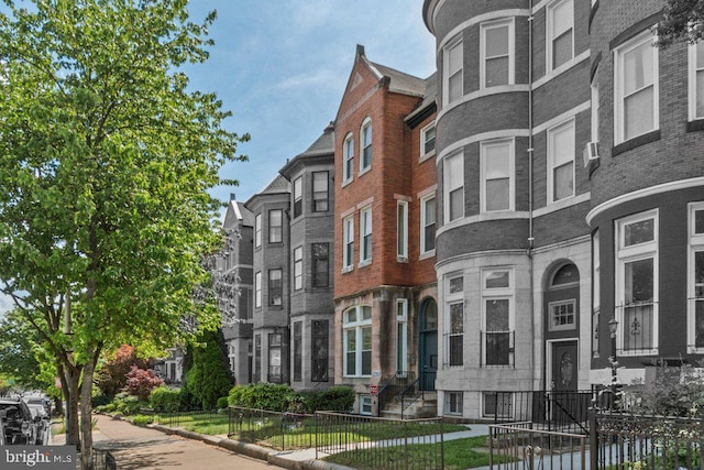 2740 Saint Paul St, Baltimore, MD 21218 - view of building exterior with a fenced front yard