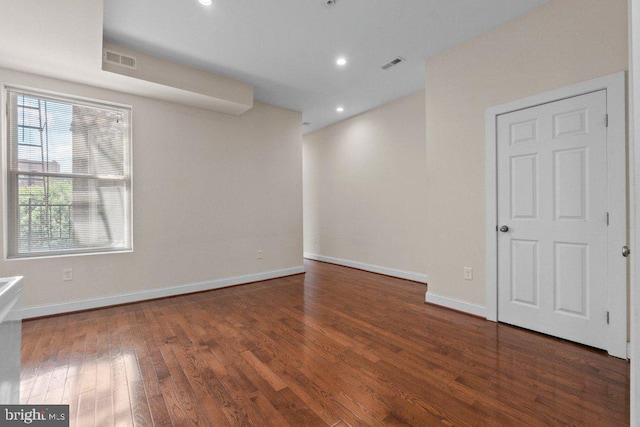 2740 Saint Paul St, Baltimore, MD 21218 - spare room with wood finished floors, baseboards, and recessed lighting