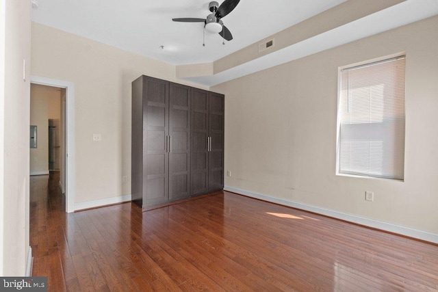 2740 Saint Paul St, Baltimore, MD 21218 - unfurnished bedroom featuring wood finished floors, baseboards, a closet, and a ceiling fan