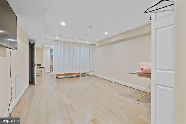 2740 Saint Paul St, Baltimore, MD 21218 - basement featuring light wood-style flooring, recessed lighting, and baseboards