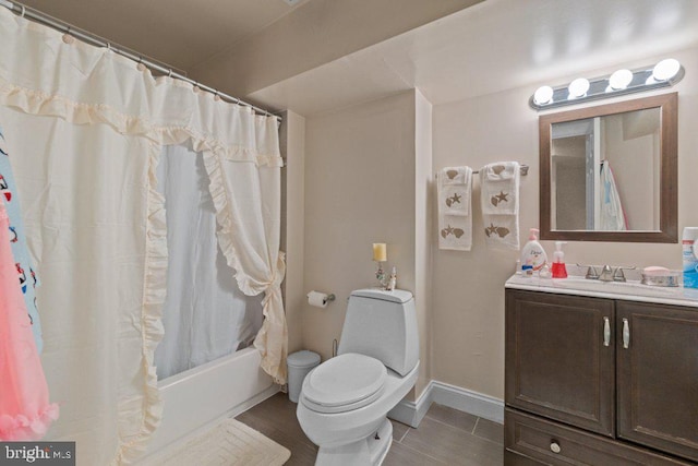 2740 Saint Paul St, Baltimore, MD 21218 - full bath featuring vanity, toilet, shower / tub combo, baseboards, and tile patterned floors