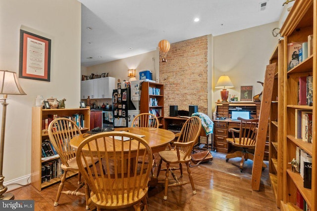 2740 Saint Paul St, Baltimore, MD 21218 - dining room featuring a desk, wood-type flooring, and recessed lighting