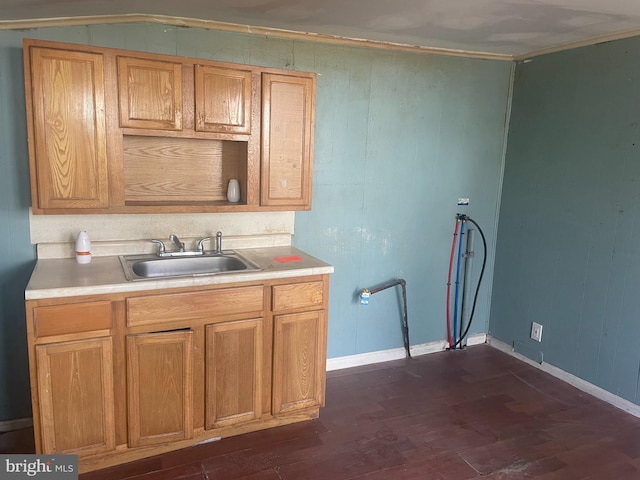 29 Church St, Bridgeton, NJ 08302 - kitchen featuring a sink, dark wood-style flooring, light countertops, and crown molding