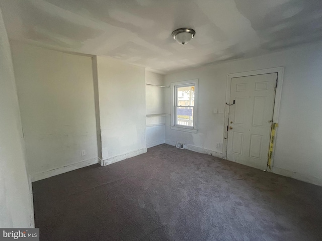 29 Church St, Bridgeton, NJ 08302 - spare room featuring dark colored carpet