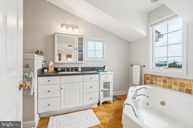 461 Anchor Rd, Tuckerton, NJ 08087 - bathroom with vanity, a tub with jets, and lofted ceiling