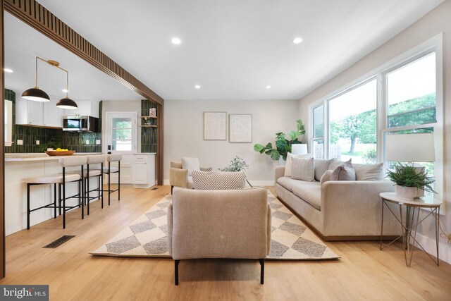 12300 La Plata St, Silver Spring, MD 20904 - living area with light wood-type flooring and recessed lighting
