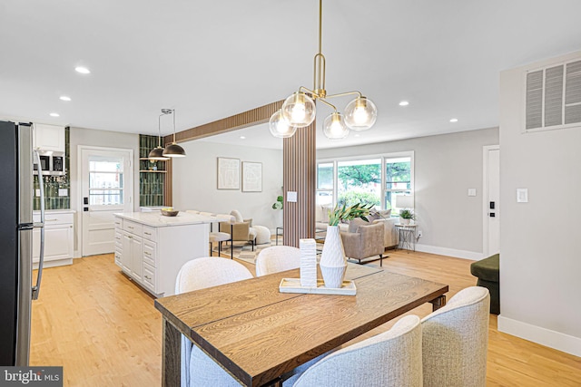 12300 La Plata St, Silver Spring, MD 20904 - dining area featuring light wood-style flooring, recessed lighting, a chandelier, and baseboards