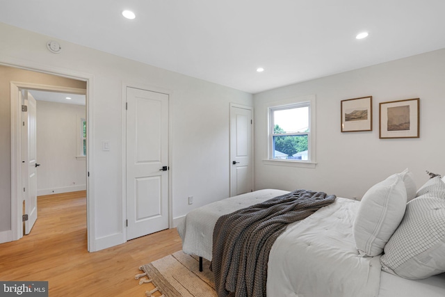 12300 La Plata St, Silver Spring, MD 20904 - bedroom with light wood-style flooring, recessed lighting, and baseboards