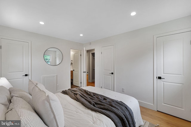 12300 La Plata St, Silver Spring, MD 20904 - bedroom with light wood finished floors, recessed lighting, and baseboards