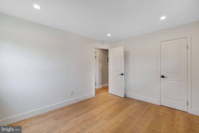 12300 La Plata St, Silver Spring, MD 20904 - unfurnished bedroom featuring light wood-style floors, baseboards, and recessed lighting
