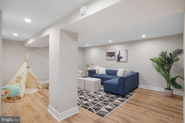 12300 La Plata St, Silver Spring, MD 20904 - living area featuring wood finished floors, baseboards, and recessed lighting